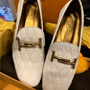 Tod's White Quilted Loafers with Gold Accents